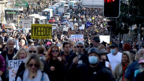 Protesters march through the streets during a 'World Wide Rally For Freedom' anti-lockdown rally in Sydney, on July 24.
