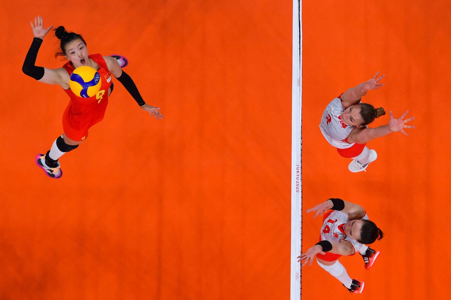 China's Zhang Changning spikes the ball in a preliminary-round volleyball match against Turkey on July 25.