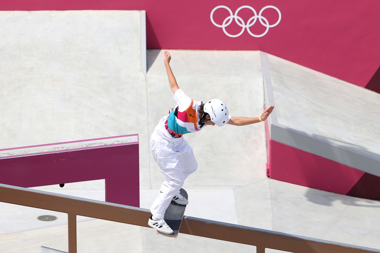 Japanese skateboarder Momiji Nishiya grinds a rail during the women's street competition on July 26. The 13-year-old <a href="index.php?page=&url=https%3A%2F%2Fwww.cnn.com%2Fworld%2Flive-news%2Ftokyo-2020-olympics-07-26-21-spt%2Fh_6946ceefadd9040136faf87fdbcd8852" target="_blank">won gold in the new event,</a> a day after fellow Japanese skateboarder Yuto Horigome won gold on the men's side. She is one of the youngest gold-medal winners in Olympic history. She is just months older than the current female record-holder, American diver Marjorie Gestring, who was 13 years and 267 days old when she won gold at the Berlin Games in 1936.