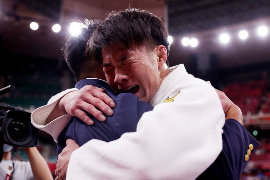 Japan's Hifumi Abe celebrates after winning gold in judo on Sunday, July 25.