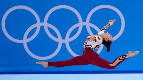 Pauline Schaefer-Betz, of Germany, performs her floor exercise routine during the women's artistic gymnastic qualifications at the 2020 Summer Olympics, Sunday in Tokyo. The team is competing in unitards that cover their legs instead of the standard high-cut leotards.