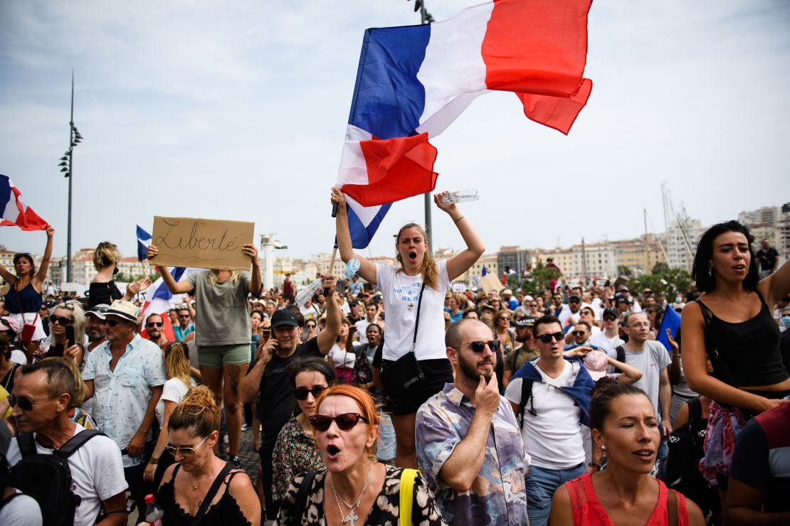 Crowds in southern France protest against a Covid pass introduced by the government in July.