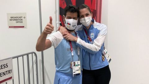 Maria Belen Perez Maurice hugs her coach, Lucas Guillermo Saucedo, after he proposed to her on the sidelines of the Olympic fencing competition in Chiba, Japan on July 26, 2021.