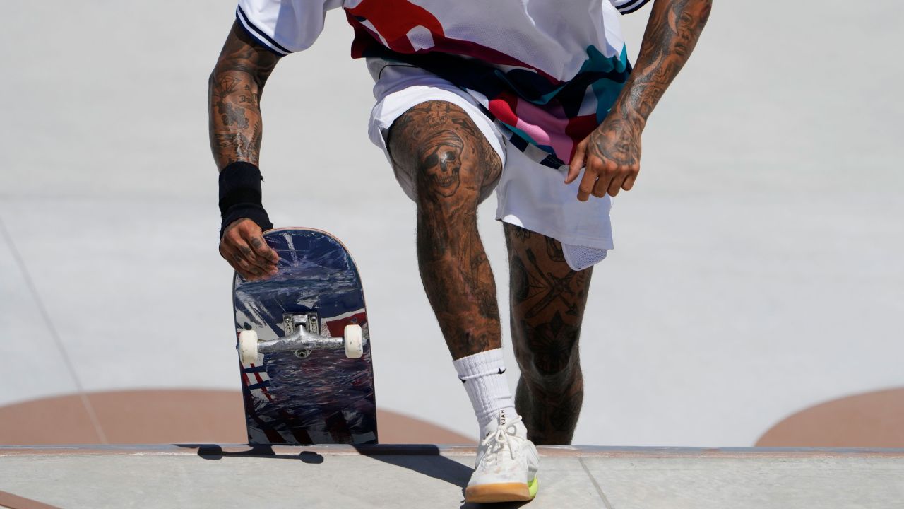 United States' Nyjah Huston, who has two full leg sleeves, competes in men's street skateboarding at the 2020 Summer Olympics on Sunday, July 25, 2021.