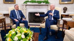 US President Joe Biden meets with Iraqi Prime Minister Mustafa Al-Kadhimi (L) in the Oval Office of the White House in Washington, DC, July 26, 2021. 