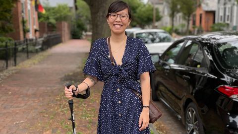 Anne, with her walking stick, in June -- five months after her car accident -- going out for lunch.