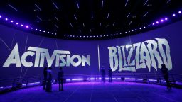 FILE - This June 13, 2013 file photo shows the Activision Blizzard Booth during the Electronic Entertainment Expo in Los Angeles. Video game maker Activision Blizzard is laying off nearly 800 workers as the company braces for a steep downturn in revenue following the best year in its history. The cutbacks announced Tuesday, Feb. 12, 2019, illustrate the boom-and-bust cycles in an industry whose fortunes are tied to video games that can have a relatively short lives before players move on to the next craze. (AP Photo/Jae C. Hong, File)