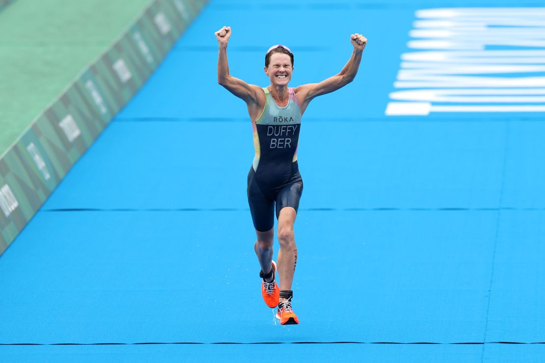 TOKYO, JAPAN - JULY 27:  Flora Duffy of Team Bermuda celebrates winning the gold medal during the Women's Individual Triathlon on day four of the Tokyo 2020 Olympic Games at Odaiba Marine Park on July 27, 2021 in Tokyo, Japan. (Photo by Cameron Spencer/Getty Images)