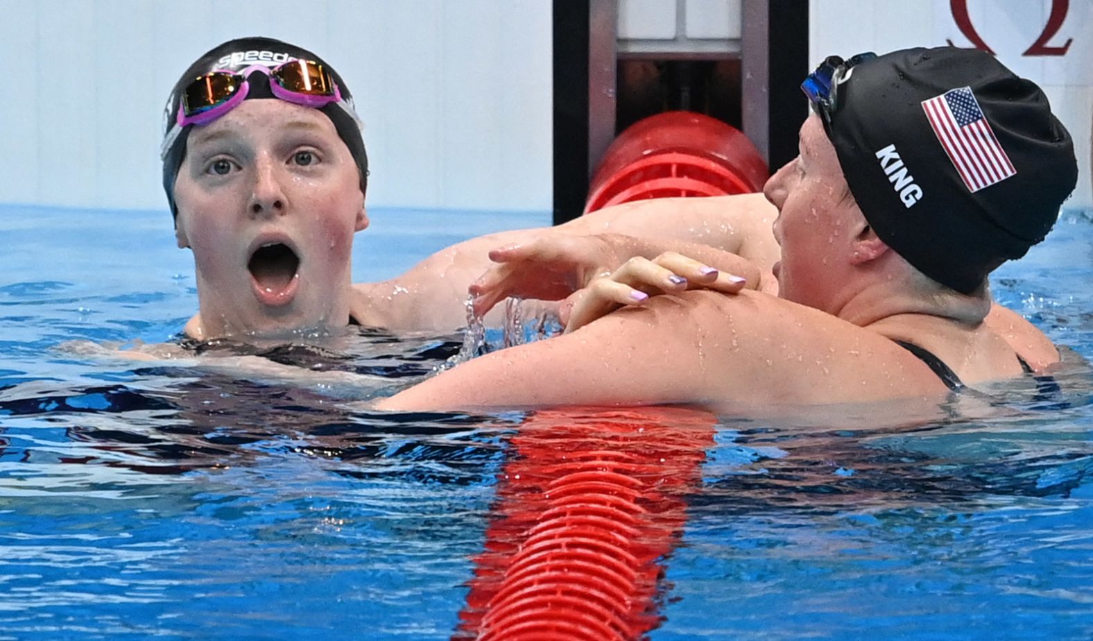 Lydia Jacoby, left, is congratulated by fellow American swimmer Lilly King after <a href="index.php?page=&url=https%3A%2F%2Fwww.cnn.com%2Fworld%2Flive-news%2Ftokyo-2020-olympics-07-26-21-spt%2Fh_8b08f43fae7fd1862ec3443ea9a91f9c" target="_blank">winning the 100-meter breaststroke</a> on July 27. Jacoby, 17, is the first-ever Olympic swimmer from Alaska, and she was not expected to win the event. King, a race favorite who won the event at the 2016 Olympics, finished with the bronze this time.