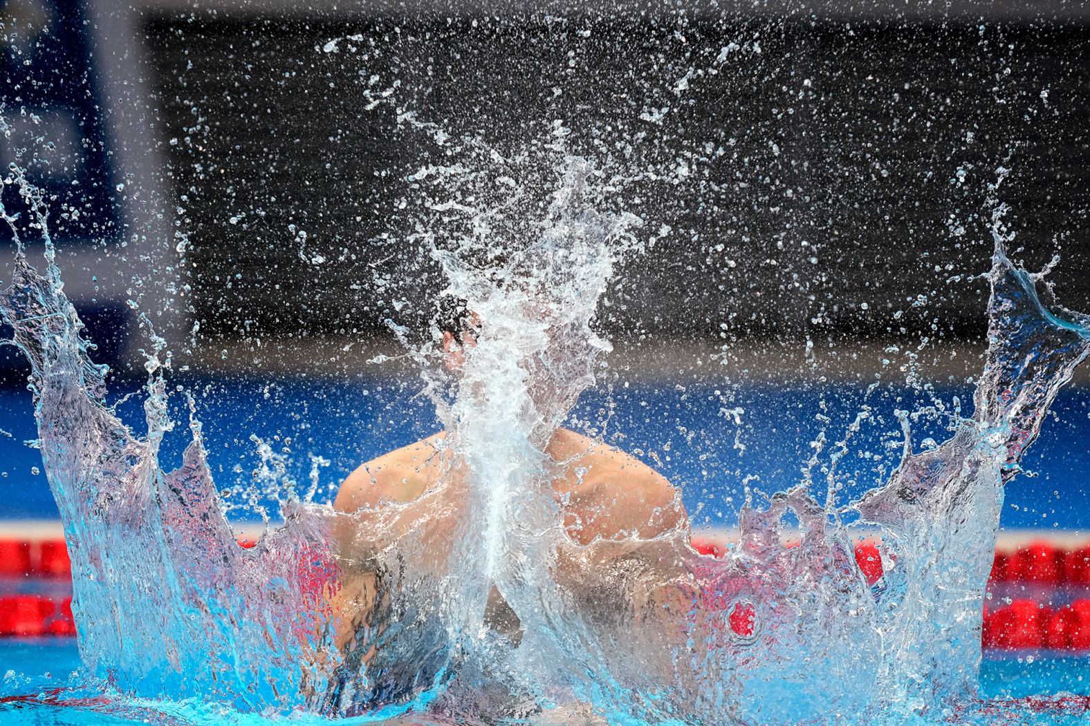 Russian swimmer Evgeny Rylov celebrates after <a href="index.php?page=&url=https%3A%2F%2Fwww.cnn.com%2Fworld%2Flive-news%2Ftokyo-2020-olympics-07-26-21-spt%2Fh_ca80c586169141bbb5c36a560e96b1cf" target="_blank">winning the 100-meter backstroke</a> on July 27. His countryman Kliment Kolesnikov won the silver.