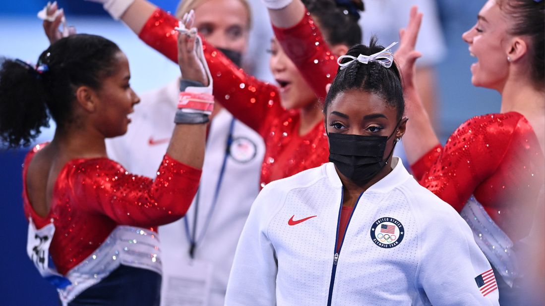 Biles wears her warm-up gear after she was pulled from the team all-around competition at the Tokyo Olympics on July 27. USA Gymnastics announced the next day that <a href="https://edition.cnn.com/2021/07/28/sport/simone-biles-gymnastics-tokyo-2020-mental-health-spt-intl/index.html" target="_blank">Biles had also withdrawn from the individual all-around competition</a> to focus on her mental health.