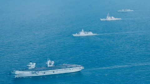 From left, the UK's HMS Queen Elizabeth, Netherlands' HNLMS Evertsen, the US Navy's USS The Sullivans, and HMS Kent steam on July 26 in Singapore waters.