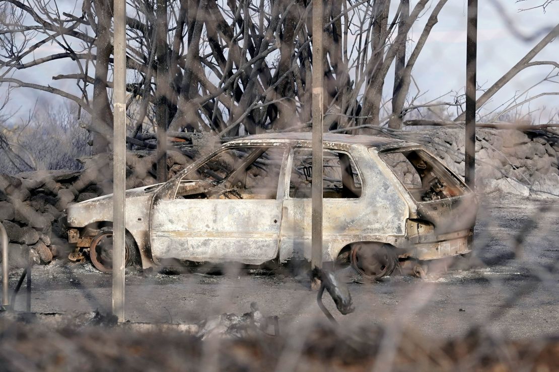 A burned car in Sardinia. The island's government declared an emergency over the weekend.