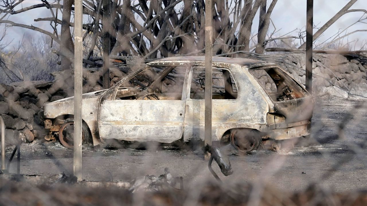 A burned car in Sardinia. The island's government declared an emergency over the weekend.