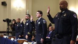 Sgt. Aquilino Gonell of the US Capitol Police, Officer Michael Fanone of the DC Metropolitan Police, Officer Daniel Hodges of the DC Metropolitan Police and Private First Class Harry Dunn of the US Capitol Police are sworn in to testify before the House Select Committee investigating the January 6 attack on US Capitol on July 27, 2021 at the U.S. Capitol in Washington, DC. During its first hearing the committee, currently made up of seven Democrats and two Republicans, will hear testimony from law enforcement officers about their experiences while defending the Capitol from the pro-Trump mob on January 6.
