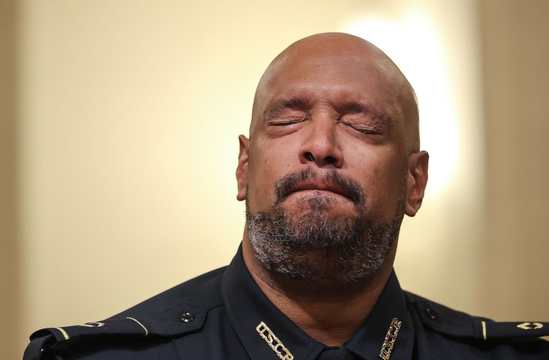 US Capitol Police officer Harry Dunn becomes emotional as he testifies before the committee Tuesday.