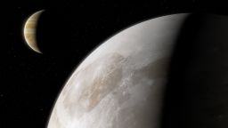 This image presents an artist's impression of Jupiter's moon Ganymede.  Astronomers have used archival datasets from the NASA/ESA Hubble Space Telescope to reveal the first evidence for water vapour in the atmosphere of Jupiter's moon Ganymede, the result of the thermal escape of water vapour from the moon's icy surface.