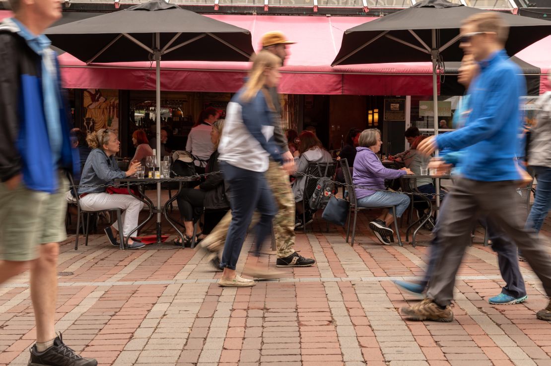 People dine outside on Church Street in downtown Burlington.