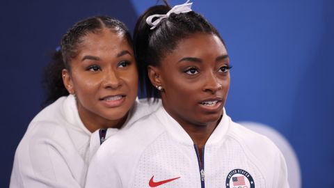 Jordan Chiles and Simone Biles of Team United States react during the Women's Team Final on day four of the Tokyo 2020 Olympic Games.