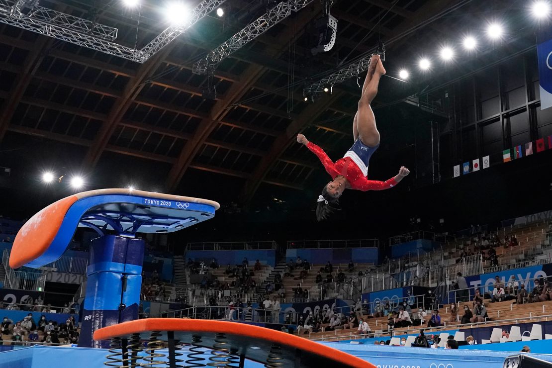 Simone Biles performs on the vault during the artistic gymnastics women's final at the 2020 Summer Olympics.