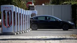 A Tesla car sits parked at a Tesla Supercharger on September 23, 2020 in Petaluma, California. 