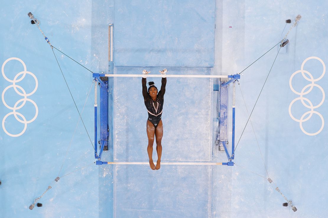 Biles trains on the uneven bars ahead of the Tokyo 2020 Olympic Games on Thursday, July 22.