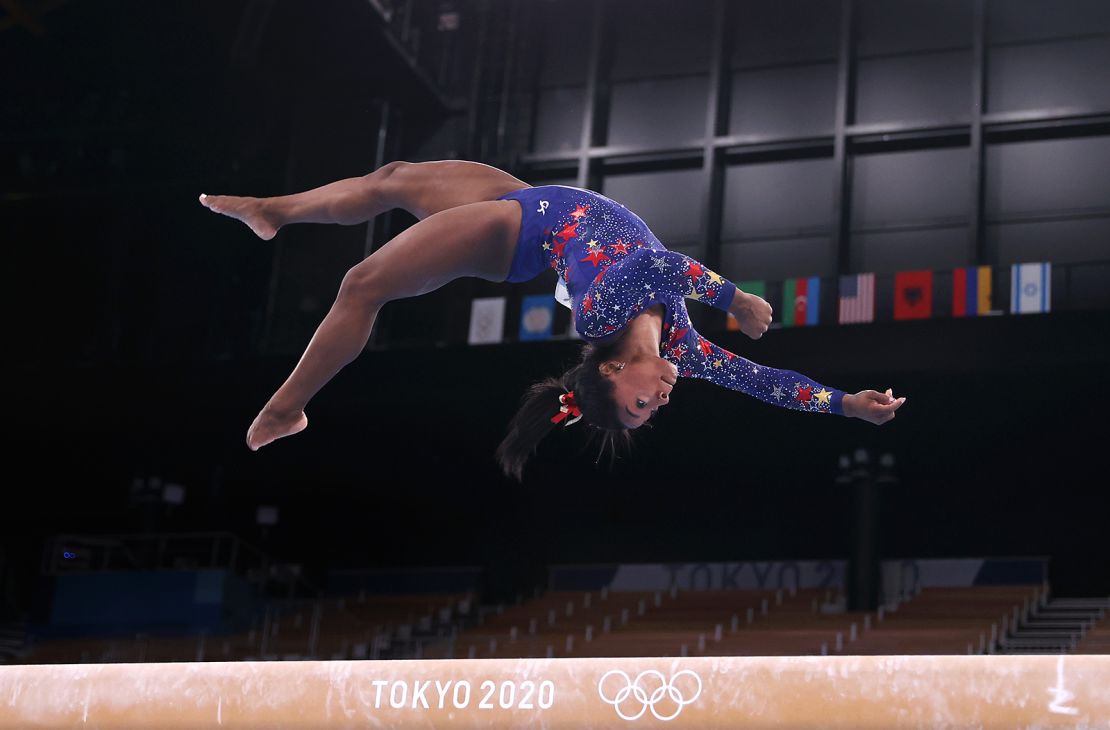 Biles competes on the balance beam at the Tokyo 2020 Olympic Games on Sunday, July 25.