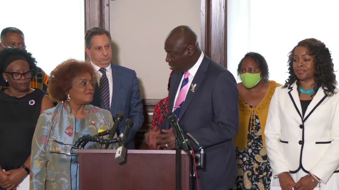 Civil rights attorney Benjamin Crump and National Council of Negro Women executive director Janice Mathis (left) host a press conference at the group's Washington D.C. office on July 27 after filing a lawsuit against Johnson & Johnson.