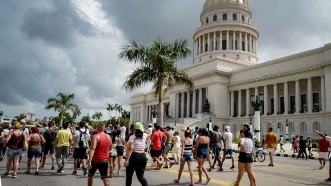 Cubans march in front of Havana's Capitol during a demonstration against the government of Cuban President Miguel Diaz-Canel in Havana, on July 11, 2021. 