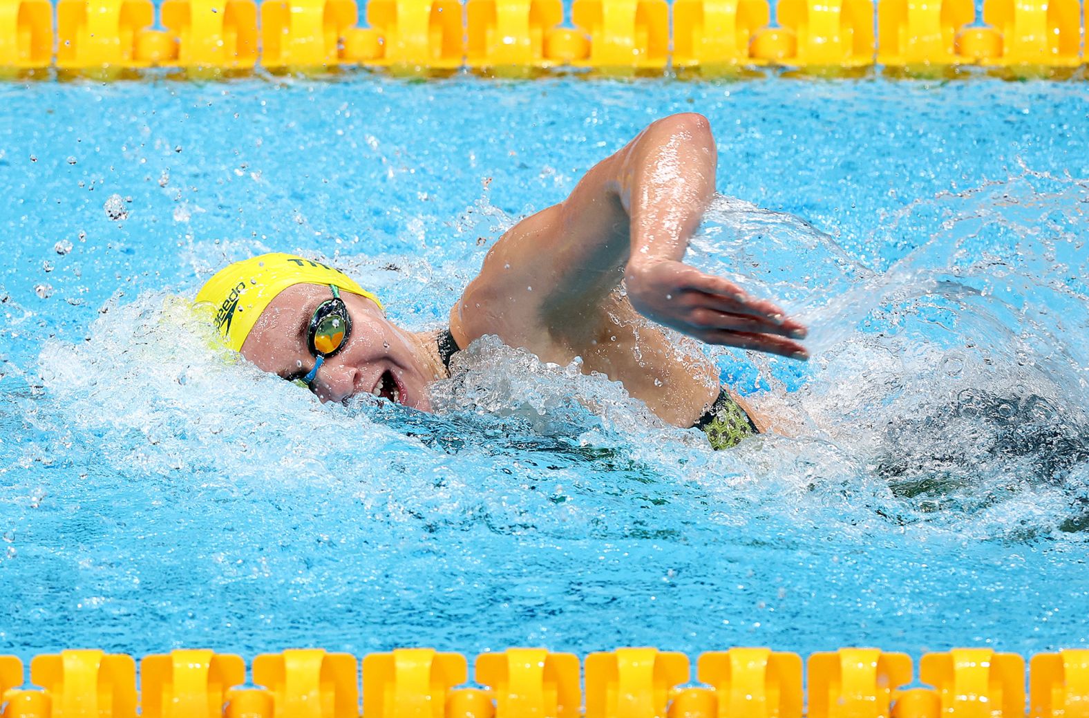 Australia's Ariarne Titmus swims her way to gold in the 200-meter freestyle on July 28. She also <a href="index.php?page=&url=https%3A%2F%2Fwww.cnn.com%2Fworld%2Flive-news%2Ftokyo-2020-olympics-07-27-21-spt%2Fh_2678ef626f78848939865d4d3a7abd69" target="_blank">set a new Olympic record,</a> finishing in 1:53.50. It is her second gold of these Olympics, as she also won the 400-meter freestyle.
