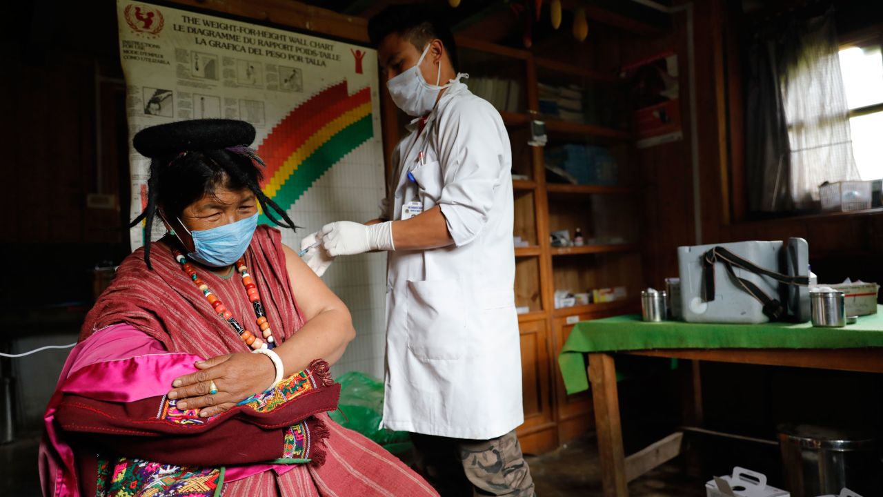 A resident of Sakteng village in far eastern district of Trashigang gets her second dose of Covid-19 vaccine at the community's health centre. 