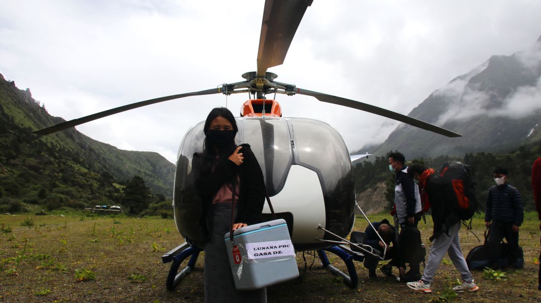 Lunana's first female health worker with the vaccine carrier that was flown into Lhedi village to conduct the second dose of Covid-19 vaccination. 