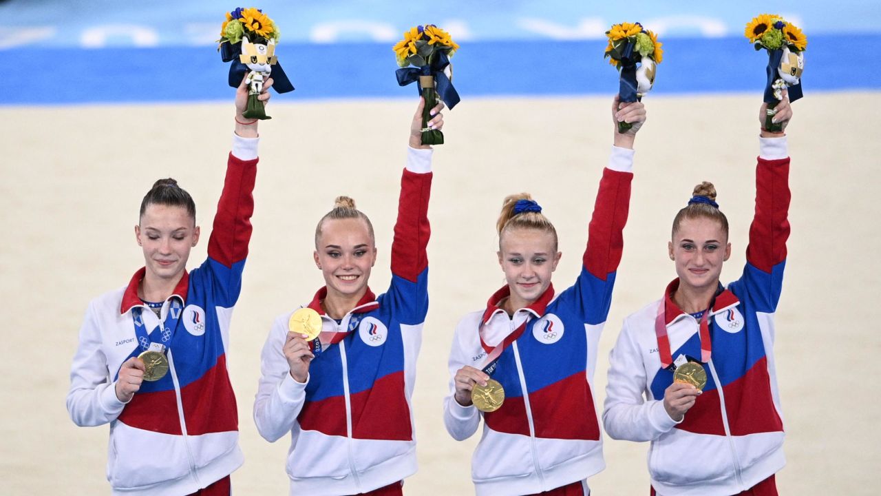 ROC's Liliia Akhaimova, Angelina Melnikova, Viktoriia Listunova and Vladislava Urazova celebrate on the podium.