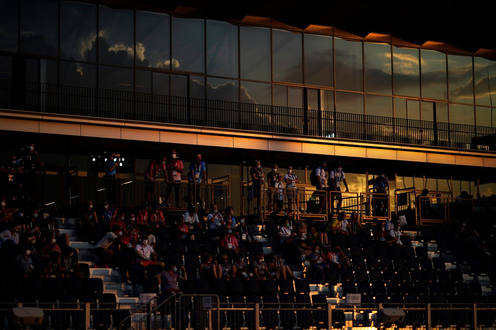 A crowd watches equestrian action on July 28.