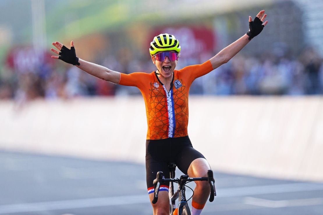 van Vleuten celebrates as she crosses the finishing line of the women's road race to win the silver medal.