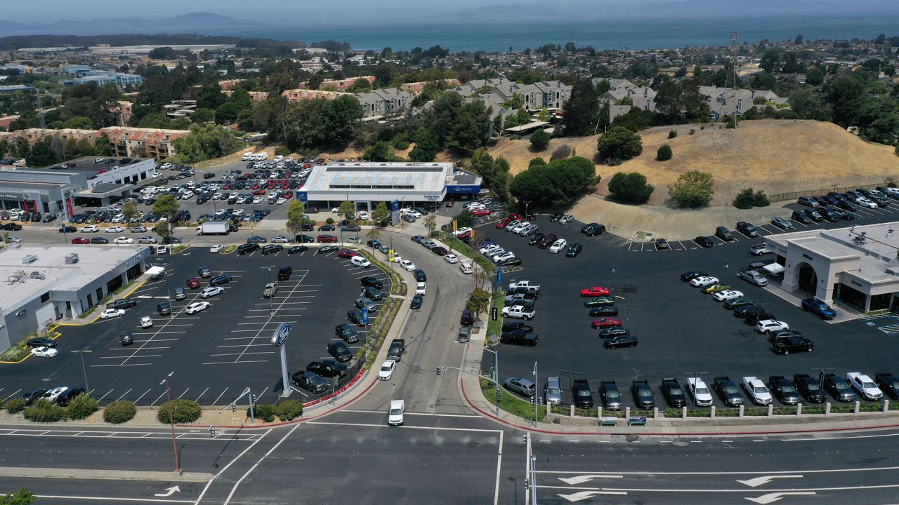 Lots at car dealers sit nearly empty in California. 