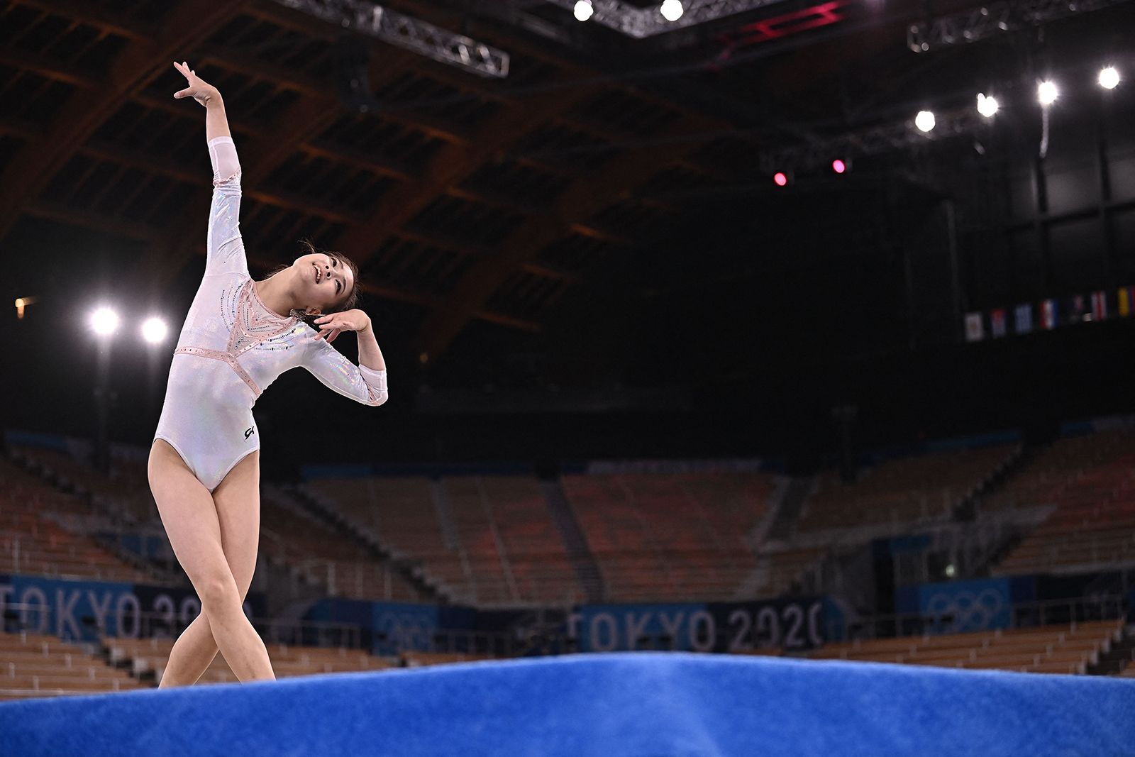 Female Gymnasts Use Music While Men