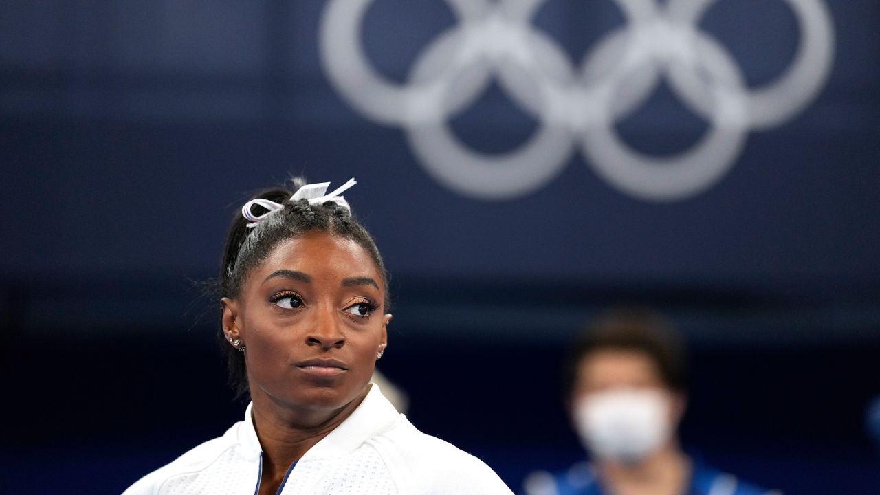 Simone Biles was a favorite to take home gold in the all-around. She still may have the opportunity to compete in other individual events, but said Tuesday that she was going to take the rest of the Olympics "one day at a time."