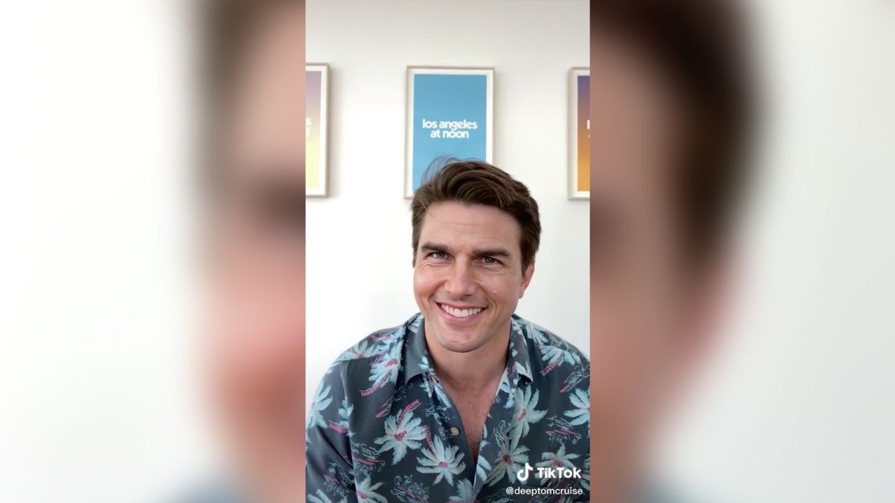 Tom Cruise isn't really grinning here — it's a deepfake video posted to TikTok earlier this year.