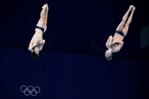 American divers Michael Hixon, left, and Andrew Capobianco compete in the synchronized 3-meter springboard event on July 28. They won silver. China's Wang Zongyuan and Xie Siyi won gold.