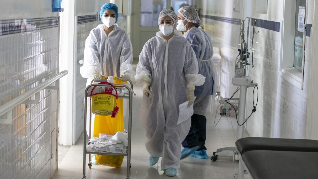 Healthcare professionals work at intensive care unit of Munci Selim Hospital, where Covid-19 patients are treated, as they spend Eid al-Adha next to their patients away from their families in Tunis, Tunisia on July 20, 2021.