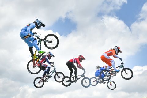 BMX racers compete in the women's quarterfinals on July 29.
