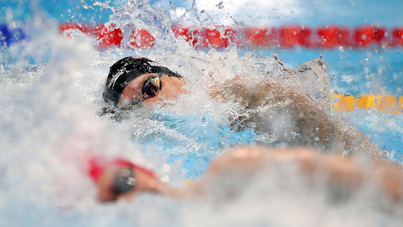 American swimmer Caeleb Dressel, top, competes in the 100-meter freestyle final on July 29. With an <a href="index.php?page=&url=https%3A%2F%2Fwww.cnn.com%2Fworld%2Flive-news%2Ftokyo-2020-olympics-07-28-21-spt%2Fh_63baf0a0f201fe751bcbe93b78f86bc7" target="_blank">Olympic record time</a> of 47.02 seconds, he won his fourth career gold medal and his second in Tokyo. He won the race by just .06 seconds.