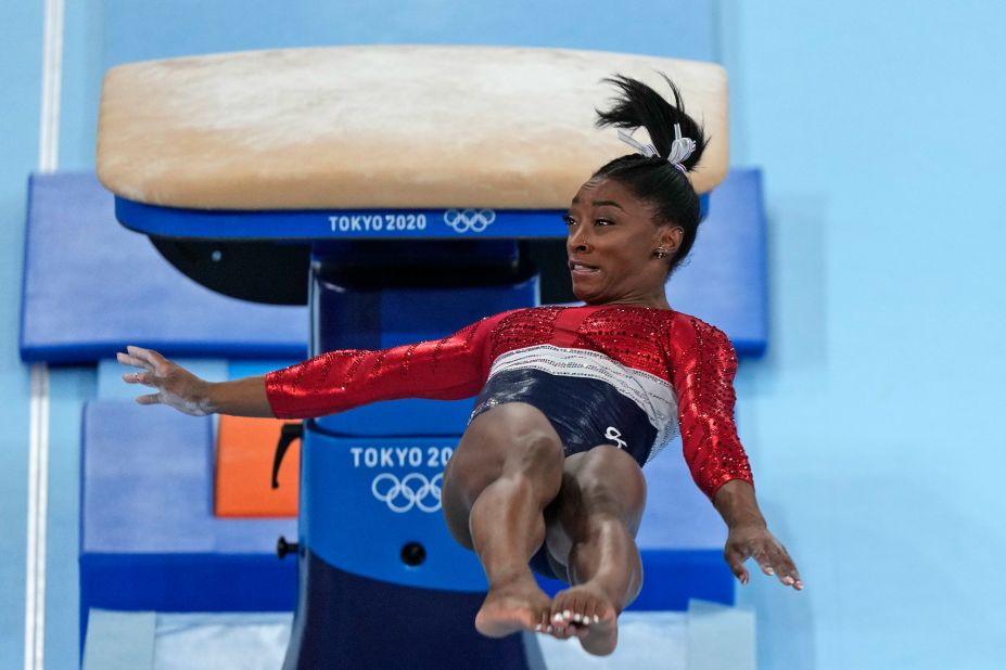 Biles lands awkwardly while competing in the team all-around at the Tokyo Olympics in July 2021. Biles stumbled on the vault landing and then <a href="https://www.cnn.com/world/live-news/tokyo-2020-olympics-07-27-21-spt/h_fbc139e365a8d111304aa45ddd4ed62b" target="_blank">pulled out of the competition</a> over mental-health concerns.