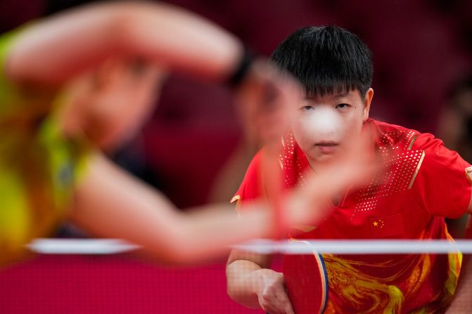 China's Sun Yingsha waits for a serve from Japan's Mima Ito during a table-tennis semifinal on July 29. Sun won to advance to the final.