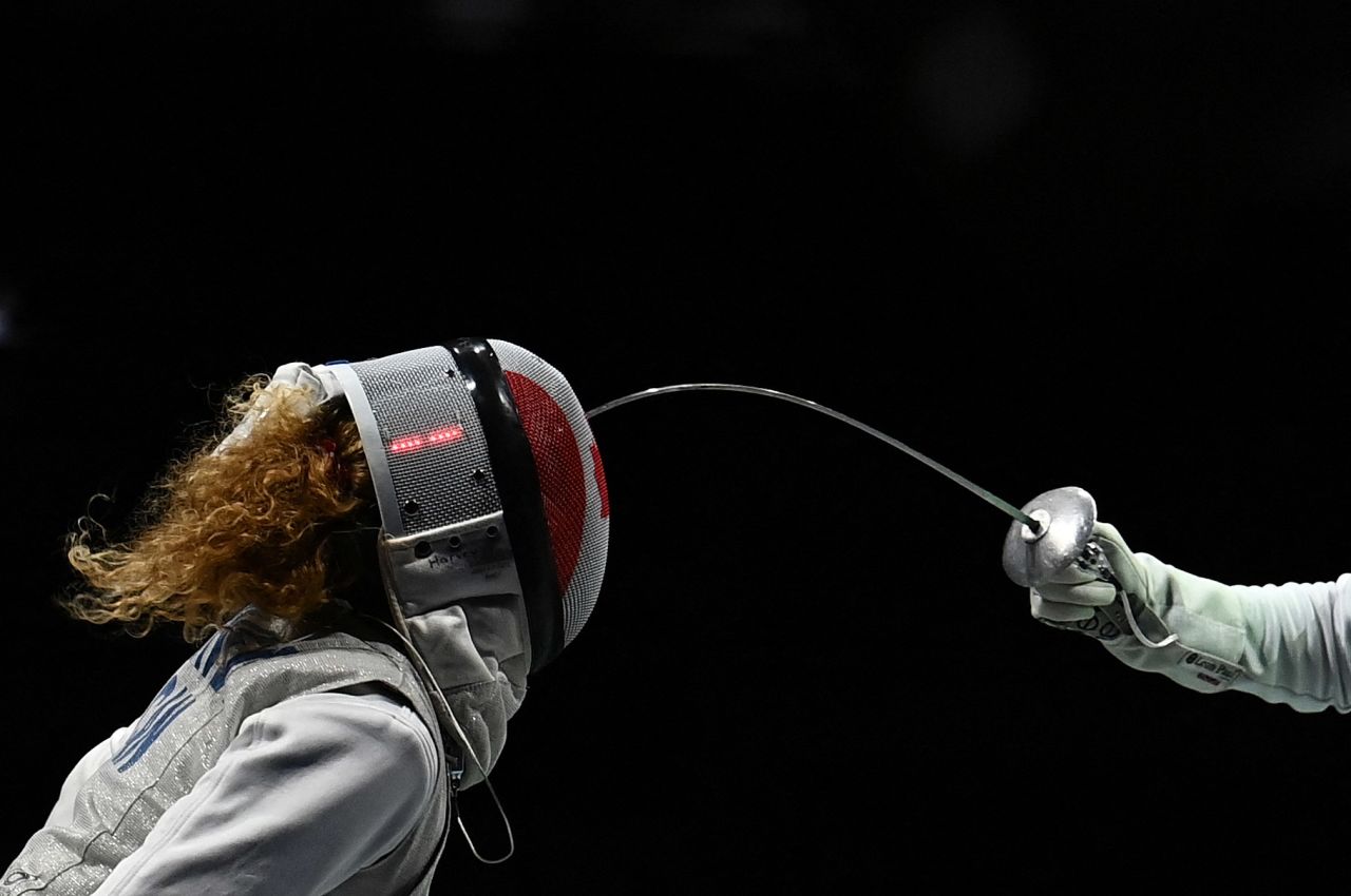 Canadian fencer Eleanor Harvey, left, competes against France's Ysaora Thibus in a foil team quarterfinal on July 29.