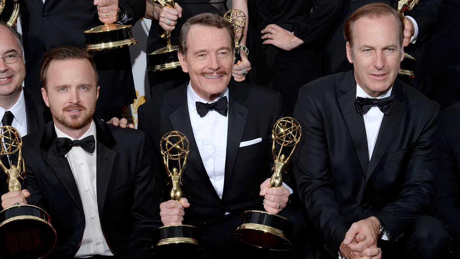 Aaron Paul, Bryan Cranston, and Bob Odenkirk, winners of Outstanding Drama Series for "Breaking Bad," pose during the 66th Annual Primetime Emmy Awards on August 25, 2014. 