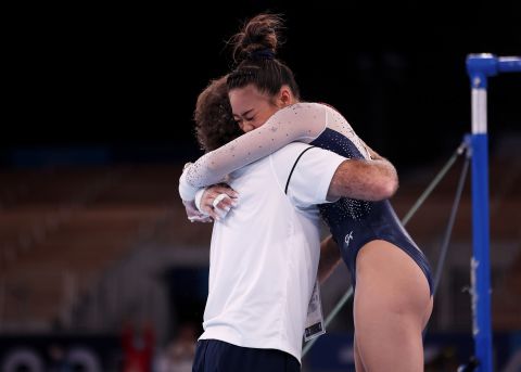 Lee celebrates after her performance on the uneven bars. Lee had the best score on that apparatus.