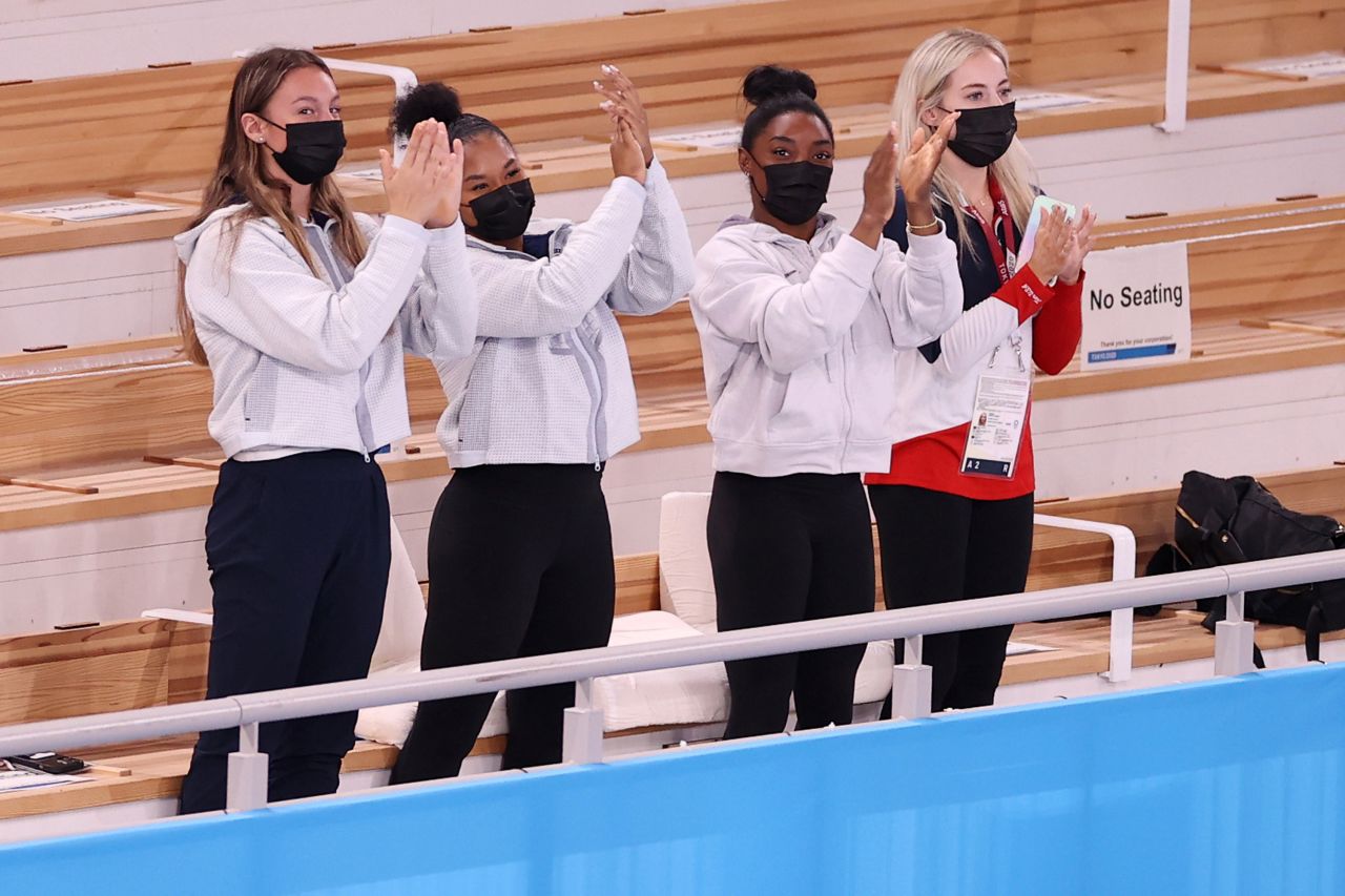 From left, US gymnasts Grace McCallum, Jordan Chiles, Simone Biles and MyKayla Skinner cheer for teammate Suni Lee after her gold-medal performance on July 29. Biles, the defending champion, <a href="https://www.cnn.com/2021/07/28/sport/simone-biles-gymnastics-tokyo-2020-mental-health-spt-intl/index.html" target="_blank">withdrew from the event</a> because of mental-health concerns. <em>Correction: This caption has been updated to include Grace McCallum, who was previously misidentified by Getty Images.</em>