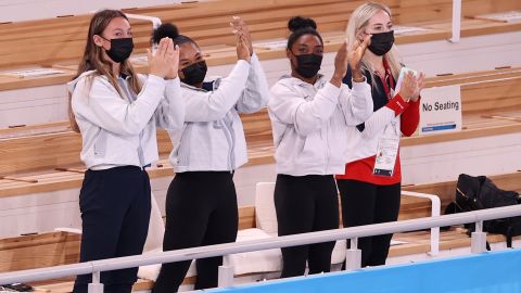 From left, US gymnasts Grace McCallum, Jordan Chiles, Simone Biles and MyKayla Skinner cheer for Lee after her gold-medal performance. Biles, the defending champion, withdrew from the event because of mental-health concerns.